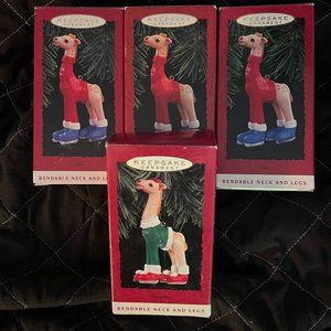 Hallmark Keepsake giraffe ornaments - three son and one daughter